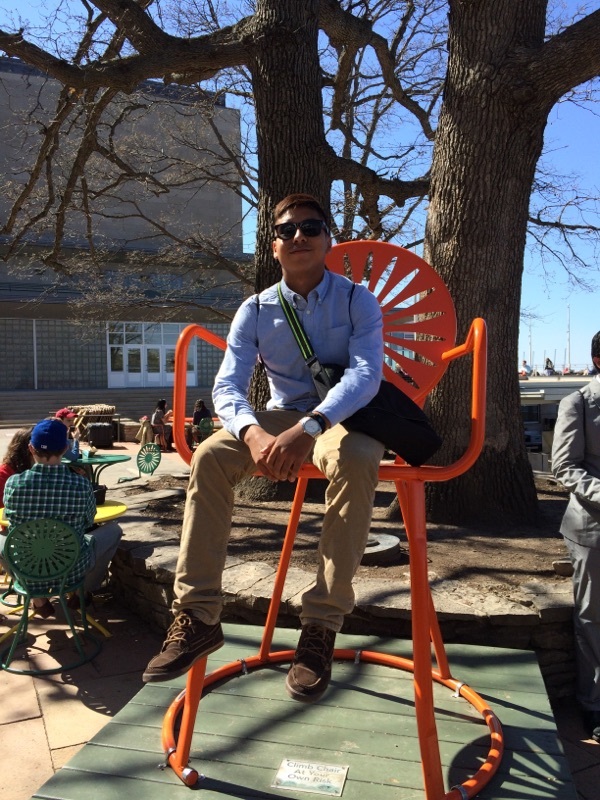 Gary Ulunque of Yorktown High School in Arlington, Va., takes a break in the iconic terrace chair during his first-ever visit to Wisconsin for the 2015 MSAN Institute.
